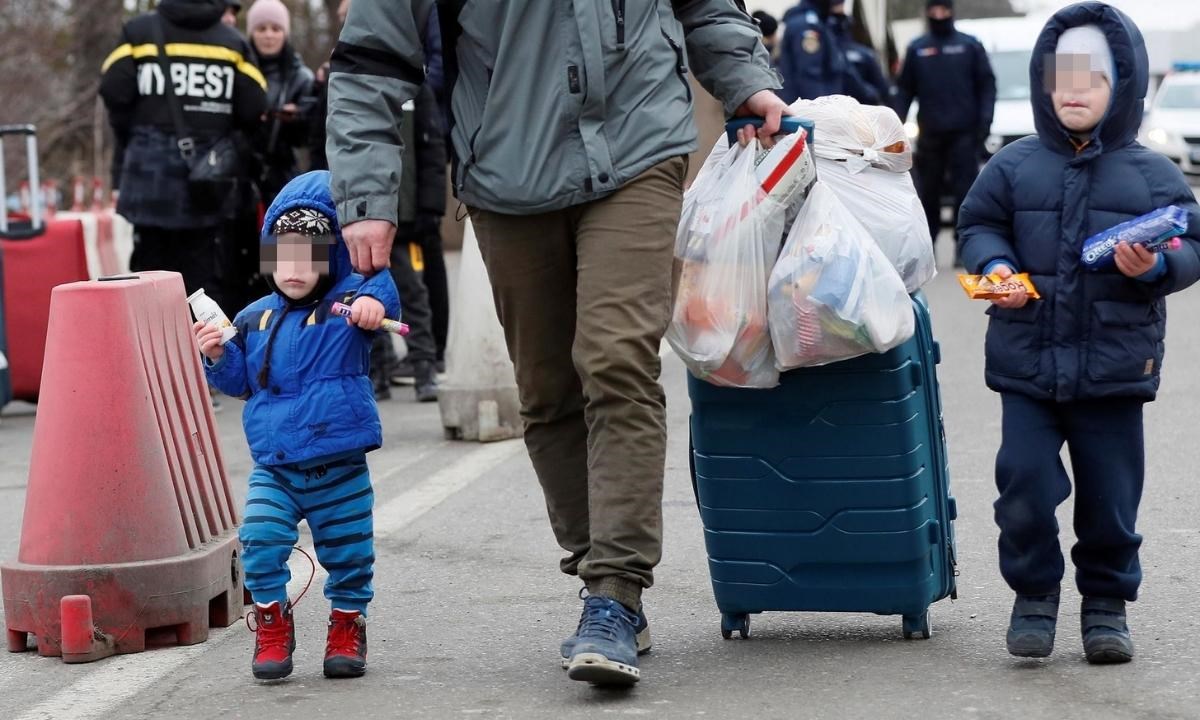 Profughi ucraini che fuggono dalla guerra